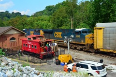 Watching the test train from the old B&O
                  caboose